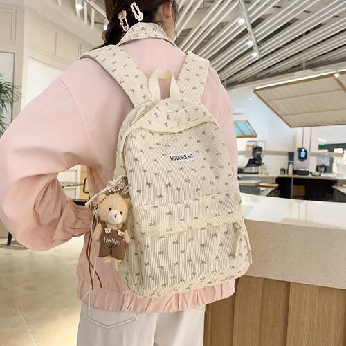 专柜春秋新款休闲双肩包书包女中大学生上课包小众设计感蝴蝶结