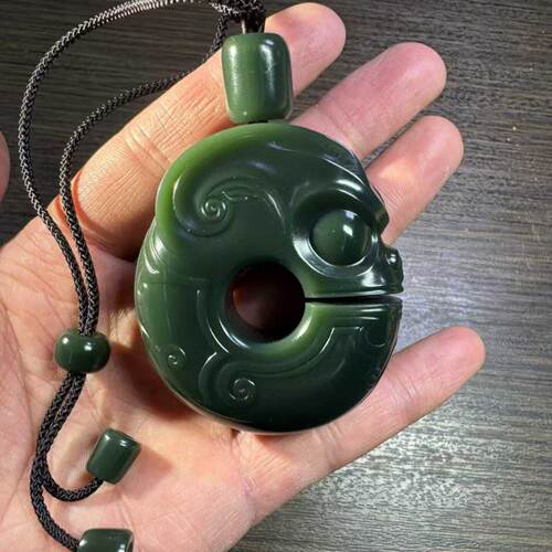 玉猪龙手把件黄绿带皮籽料定制