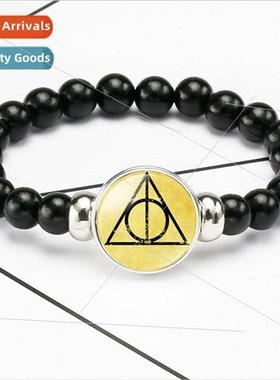 Harry Potter Gold Flyers Deathly Hallows  Time Gemstone Hand