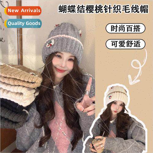 Winter warm knitted cap cute bow cherry wool cap Korea versa