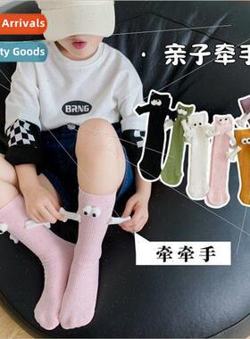 Magnetic will hold hands socks nd of matching stockings soli