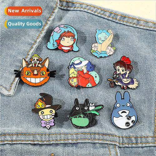 Japanese anime cartoon characters around the metal badge Sca