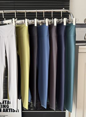 青岛外贸wunder磨毛女士24寸瑜伽裤高腰腿印花提臀健身裤干九分裤