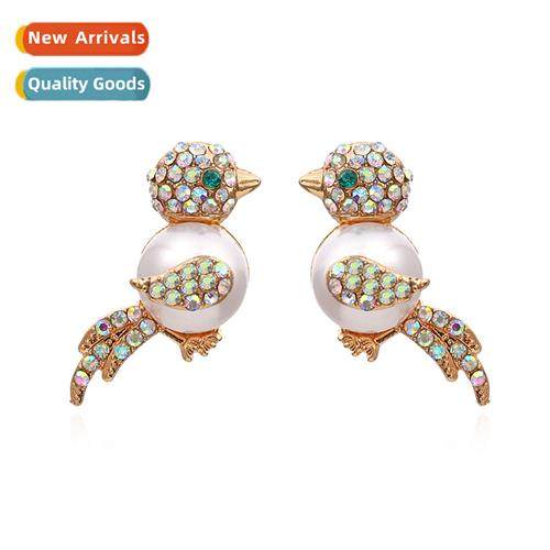 Korean exaggerated bird wh diamd earrings retro persaly pear
