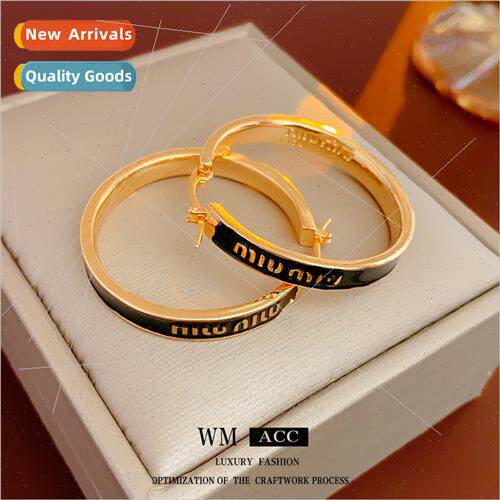 Electroplated drip oil letters circle metal earrings Europe