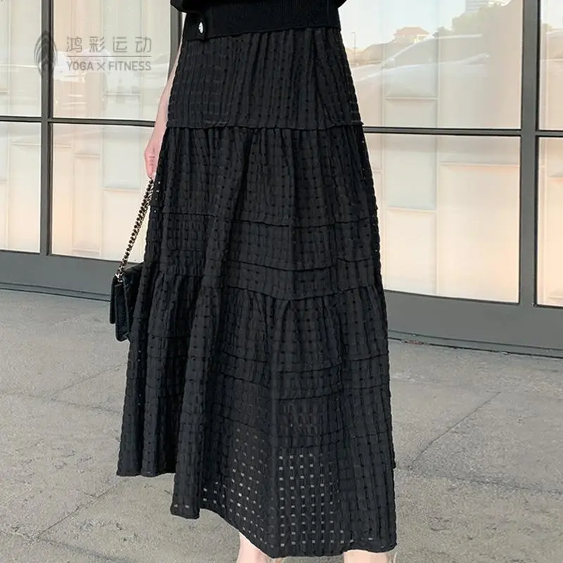 2025春季新款韩版女装淑女纯色松紧腰网格镂空半身裙中长款伞裙女