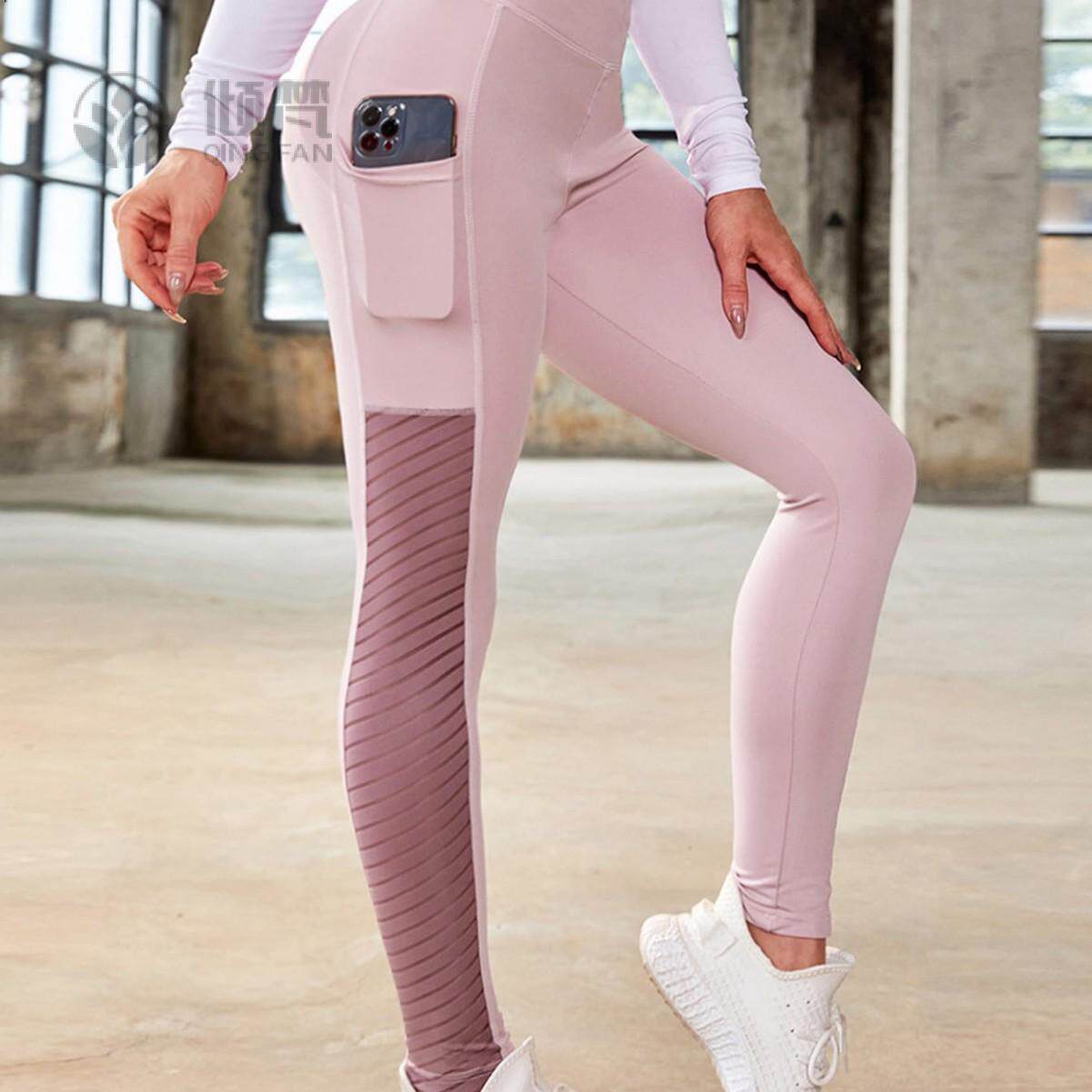 新款欧腰提臀网纱口袋拼接瑜伽健身运动紧身九分打底裤女