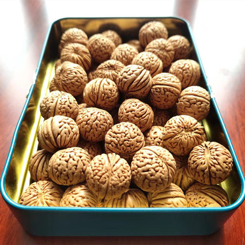 现代桃核脑纹手串料精品