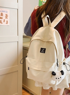 书包女大学生原创设计感简约百搭大容量初中生高中白色双肩包背包