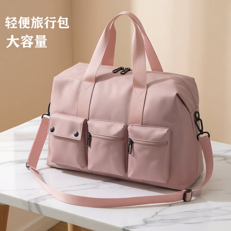 旅行包大容量结实耐用行李包男款多口袋手提斜挎包女行李袋健身包