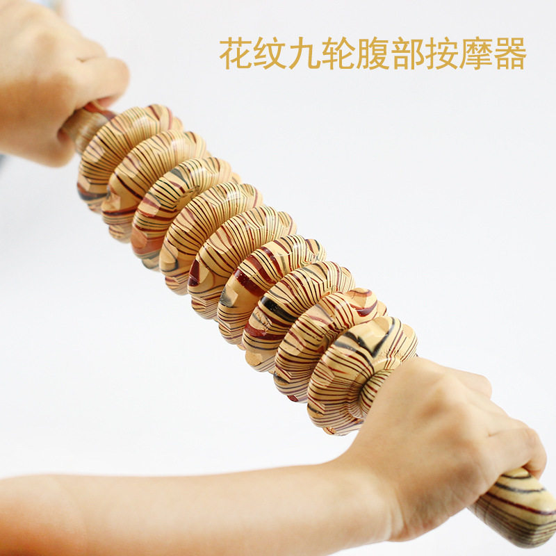厂家直销木纹九轮按器木质腹部滚轮按器多功能家用按器