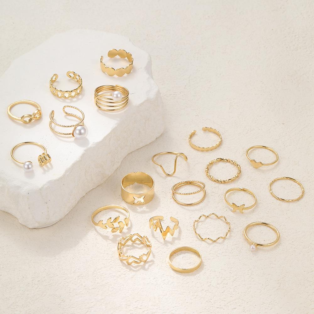 20 piece set of hollowed out butterfly pearl rings