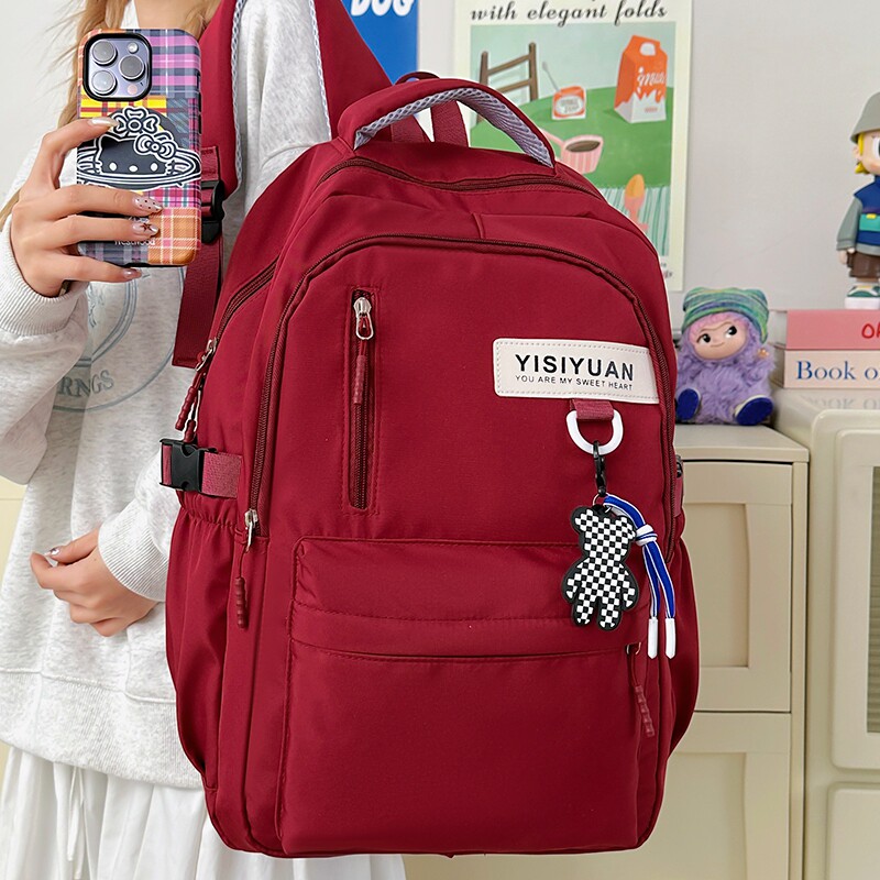 时尚百搭高颜值双肩包女大容量轻便学生背包男高中大学生尼龙书包