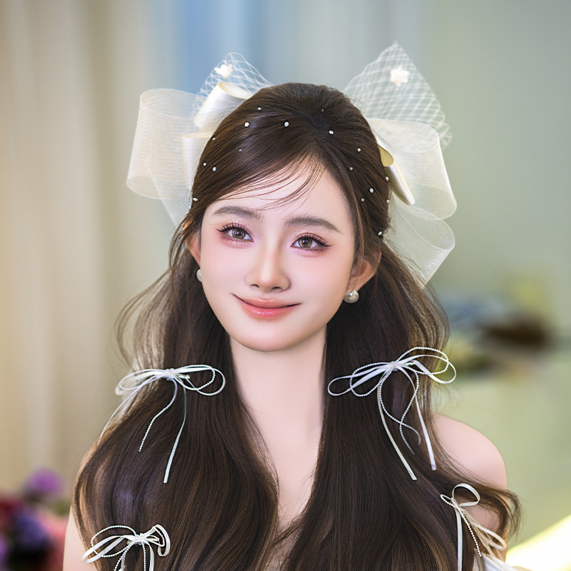 2025新娘发饰新款缎面网纱蝴蝶结后区发夹唯美温柔礼服写真配饰品