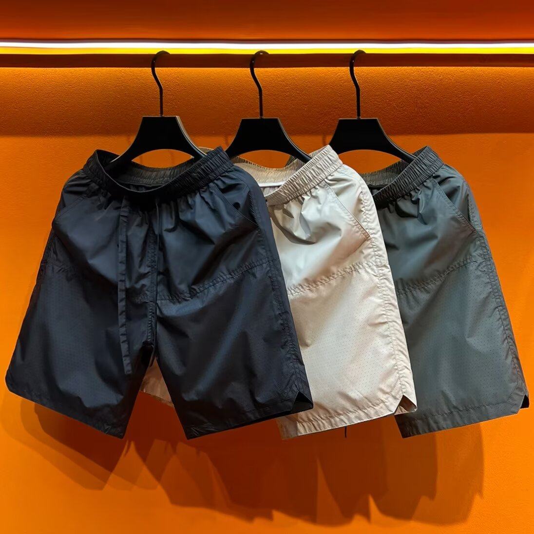 夏季新款激光打孔透气休闲短裤男简约时尚百搭宽松速干冰丝五分裤,男装,大码下装,淘宝优惠券,粉丝福利购,淘宝优惠卷