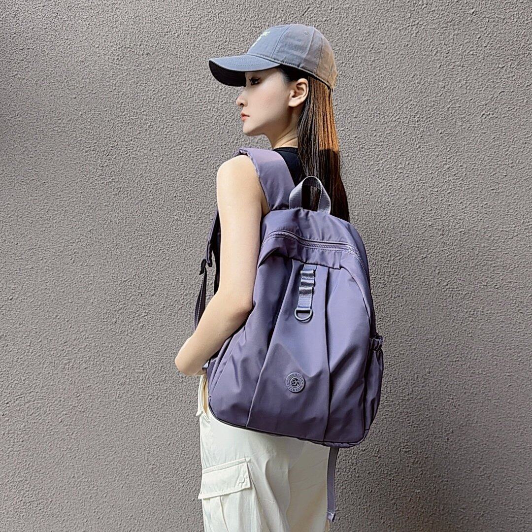 休闲双肩包男女款背包图片