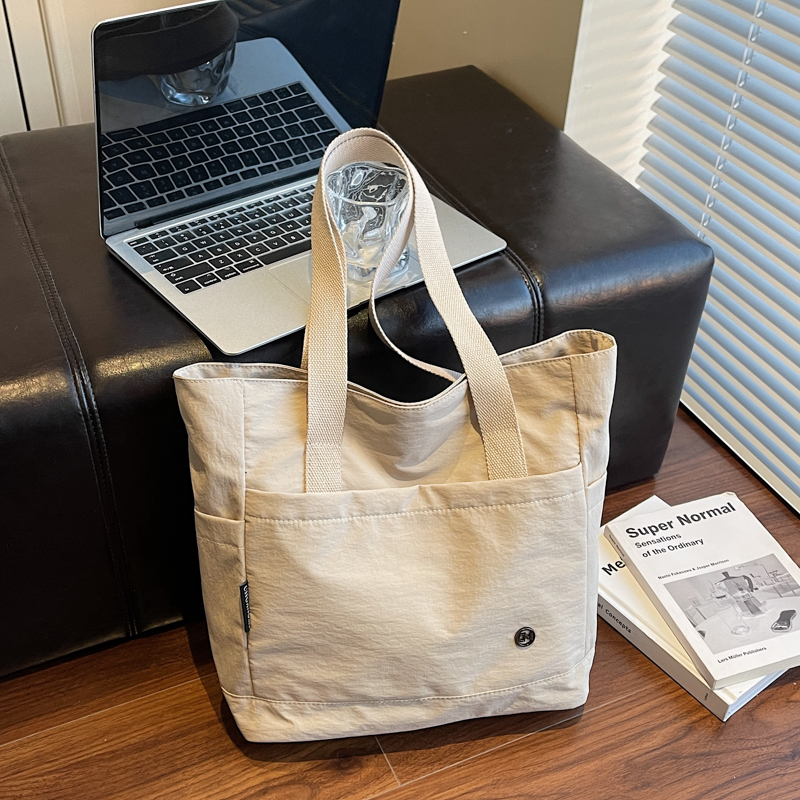 布袋包帆布包包女士2025新款上班通勤简约文艺手提袋大容量单肩包
