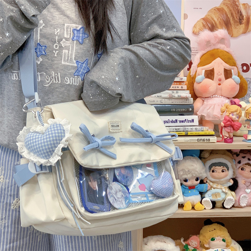日系二次元痛包小食量斜挎包大容量休闲帆布包通勤百搭学生单肩包