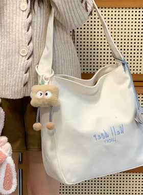 简约时尚托特包包女2025新款红色帆布包大容量学生通勤补课单肩包