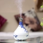 Máy phun sương nhỏ làm ẩm nhà câm phòng ngủ văn phòng sương mù tinh dầu tinh dầu máy tính để bàn máy hương liệu không khí - Máy giữ ẩm máy tạo độ ẩm innisfree