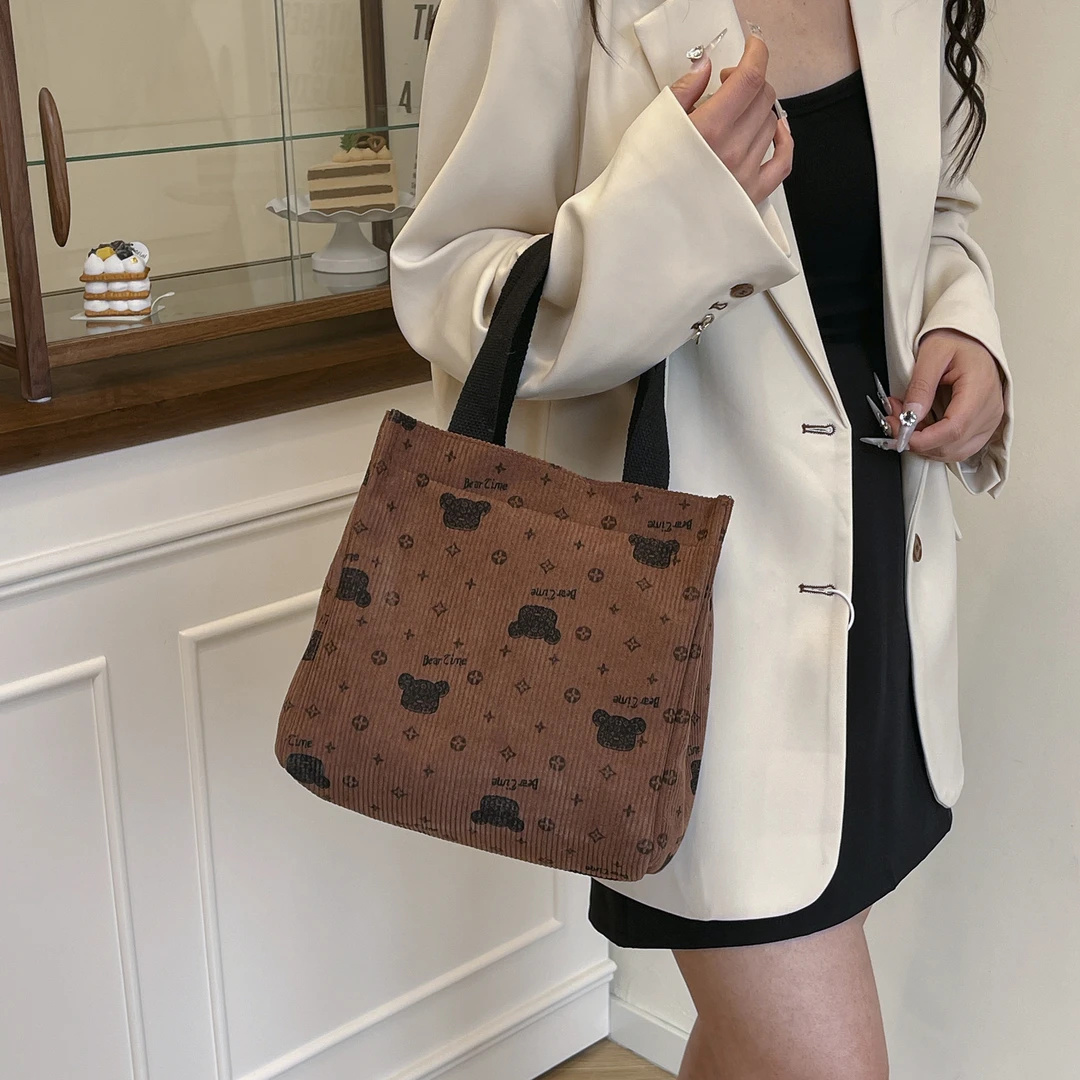 2025新款灯芯绒手提斜挎妈咪包