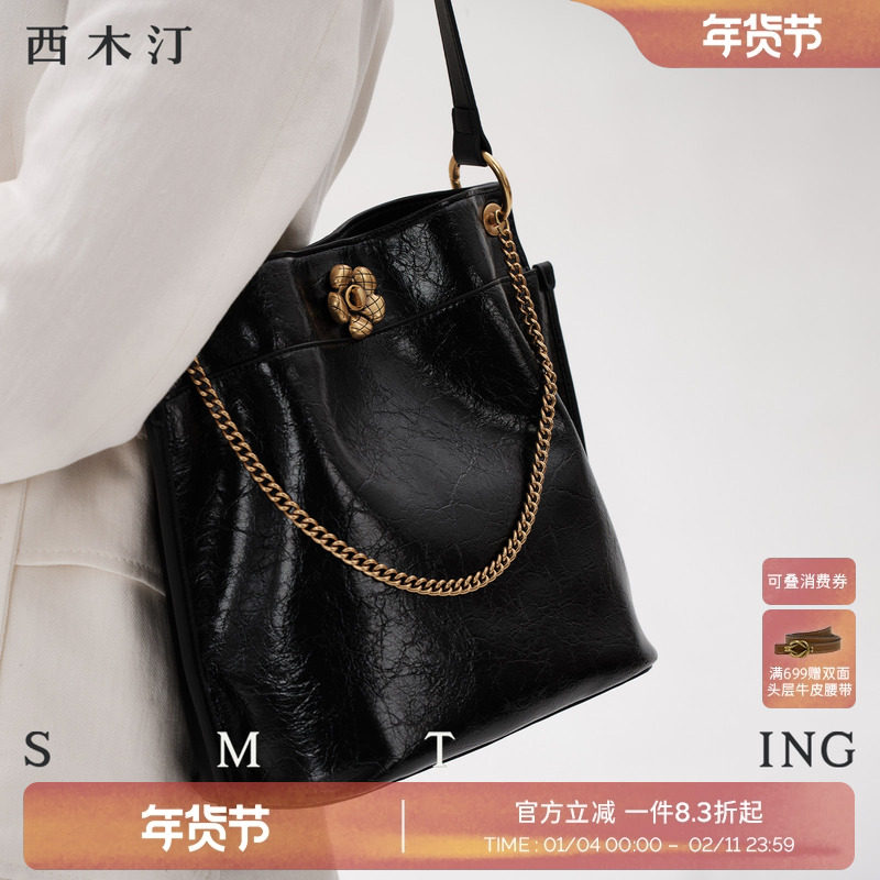 西木汀伊人夕岸 牛皮单肩水桶包女高级感小众设计大容量斜挎包包,箱包皮具/热销女包/男包,水桶包,淘宝优惠券,粉丝福利购,淘宝优惠卷