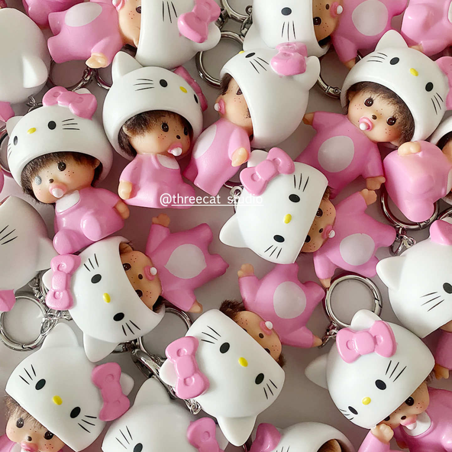 kitty猫咪粉色蒙奇奇挂件图片