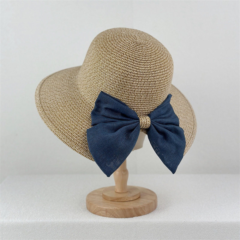 夏新款赫本风手工编织草帽女高级感优雅时尚渔夫帽子出游遮阳防晒