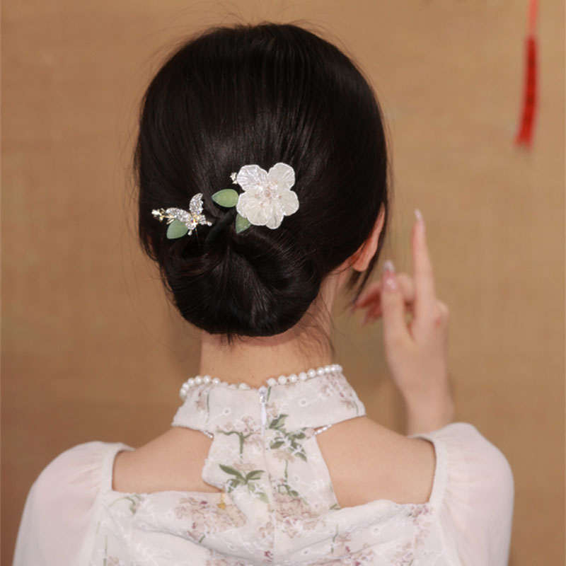 高級感山茶花蝴蝶女萬能盤發器丸