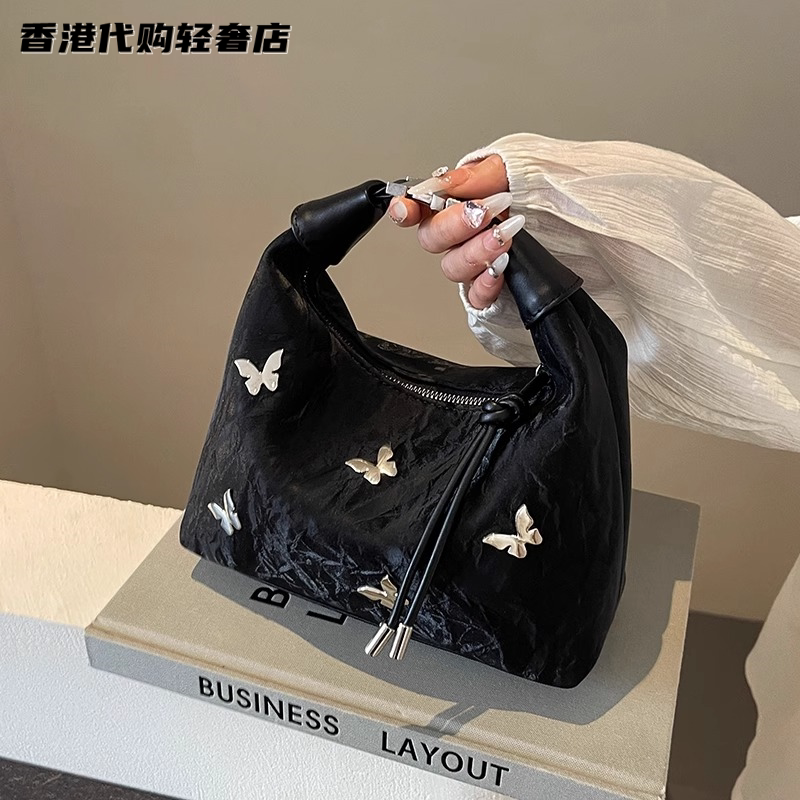 法国ZAMP高级感真皮手提饺子包女新款百搭斜挎包大容量单肩腋下包