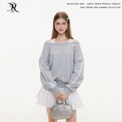 REACH原创春秋新款钉珠卫衣女斜肩长袖宽松假两件套头露肩上衣服