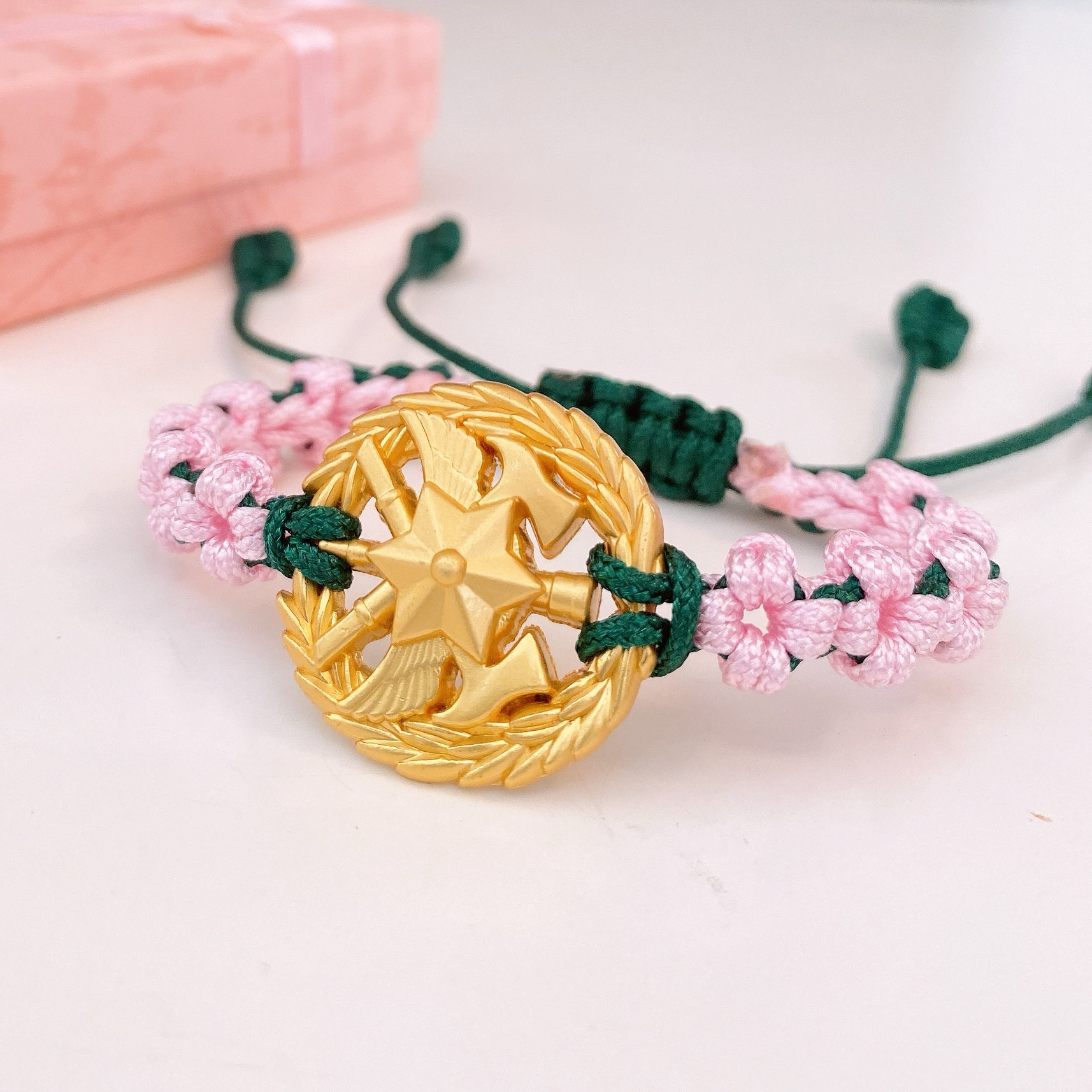 粉色桃花结消防领花编织手链