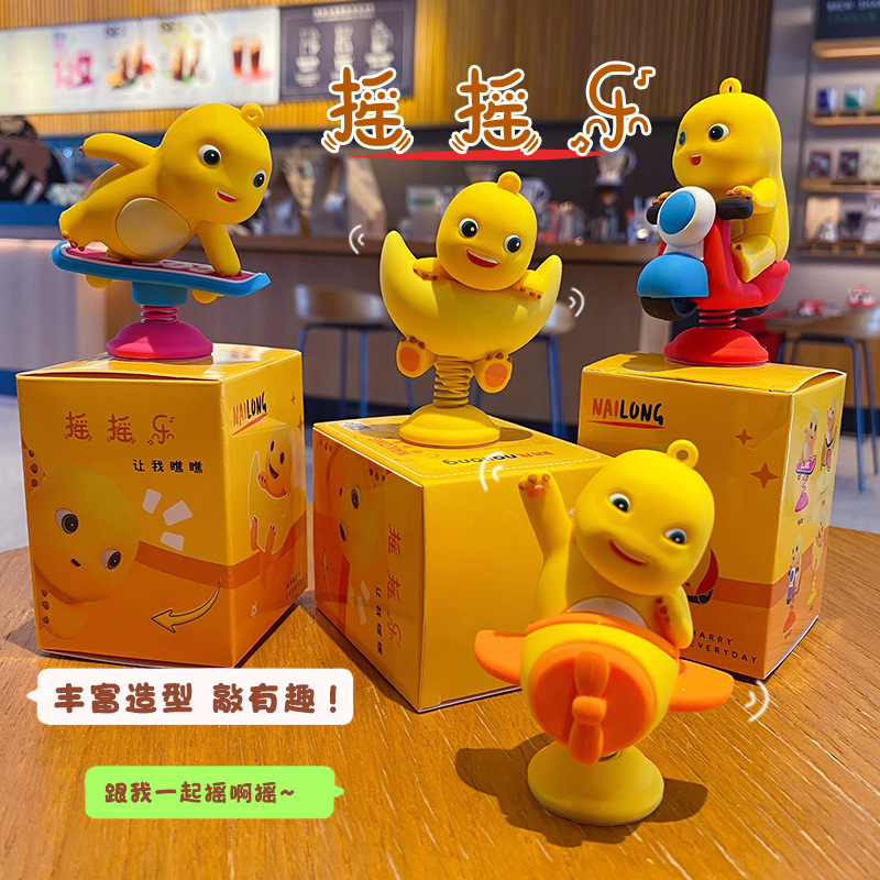 卡通奶龙潮玩手办解压摇摇乐车用电动车装饰摆件可爱公仔桌面饰品