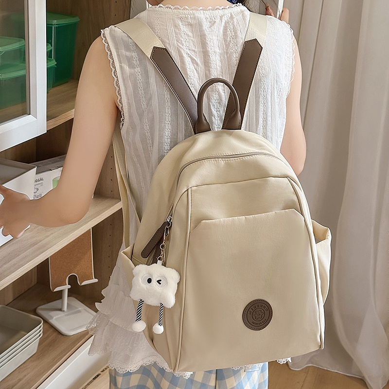 新款简约纯色双肩包女休闲旅行包