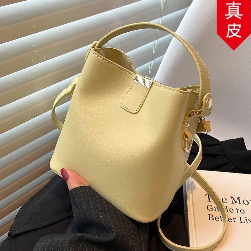小洋气女单新款肩轻奢女士众包百搭包2026水桶真皮包手提包斜挎包