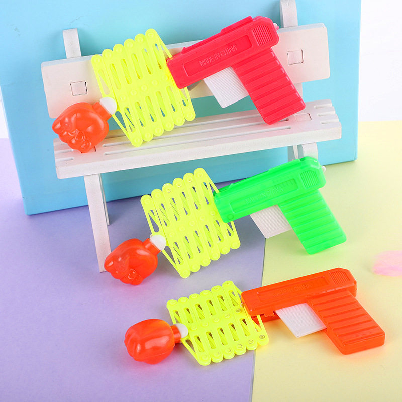 儿童整蛊搞怪玩具魔魔术弹力伸缩拳头枪小孩玩具80后童年怀旧经典