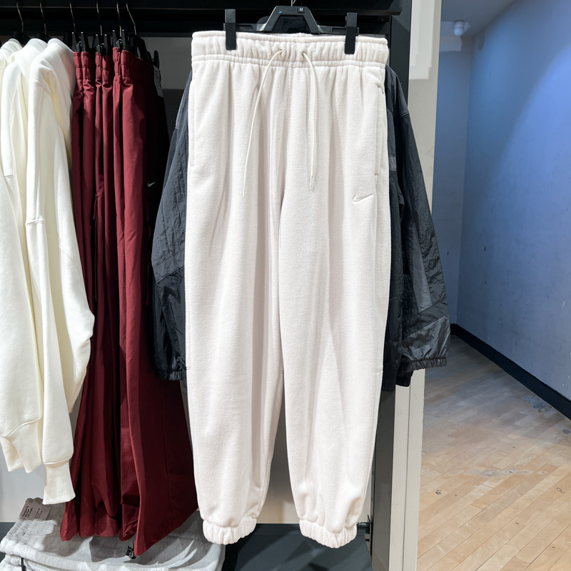 Nike耐克女子2025春季新款摇粒绒保暖运动休闲束脚长裤FB5579-104