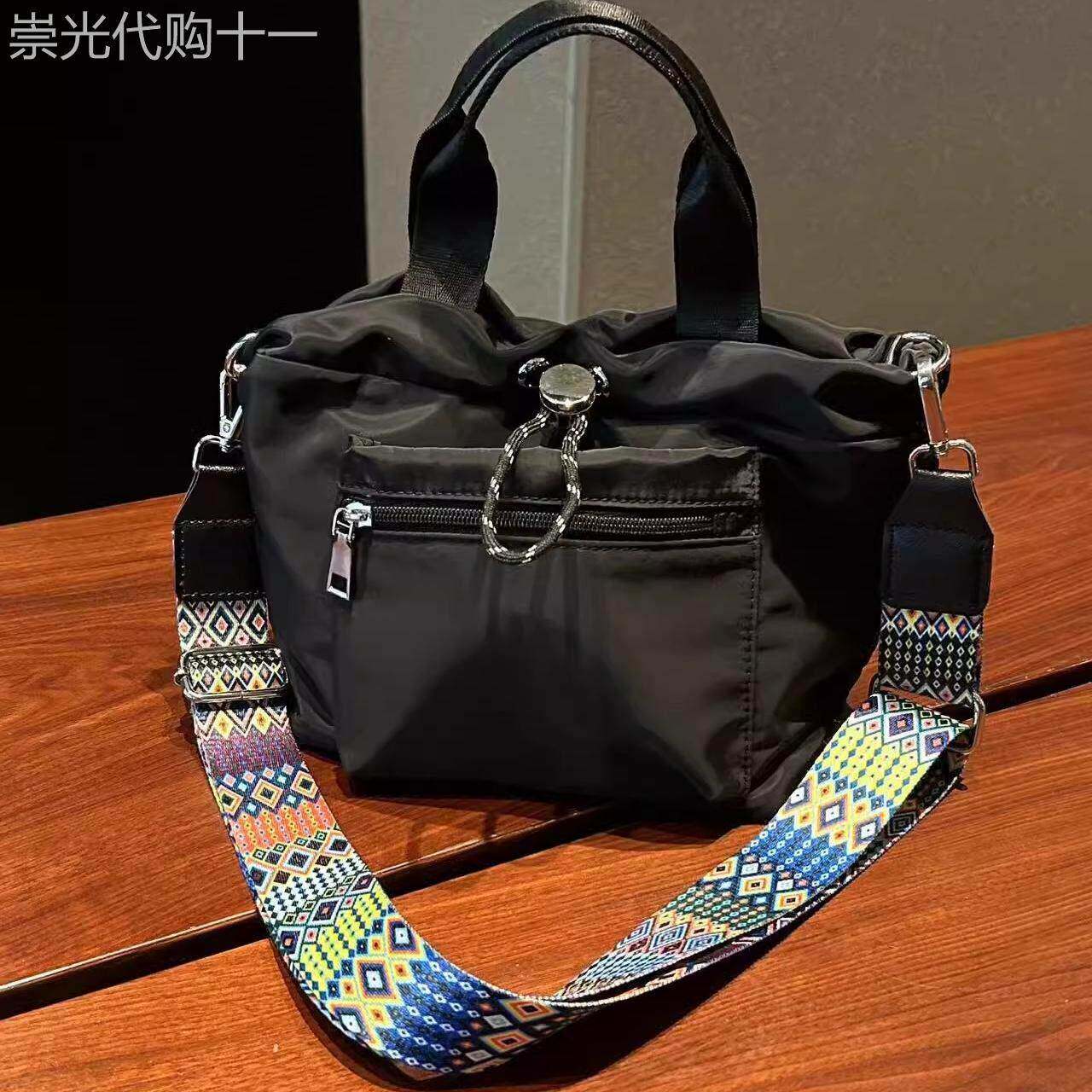 香港IT Catherine个性小方包抽绳水桶包尼龙防水面料手提包百搭潮