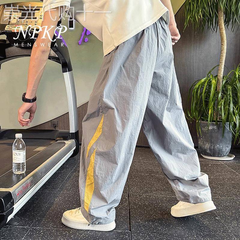 潮牌休闲裤男款春秋2026新款痞帅宽松透气哈伦裤潮流薄款速干裤子
