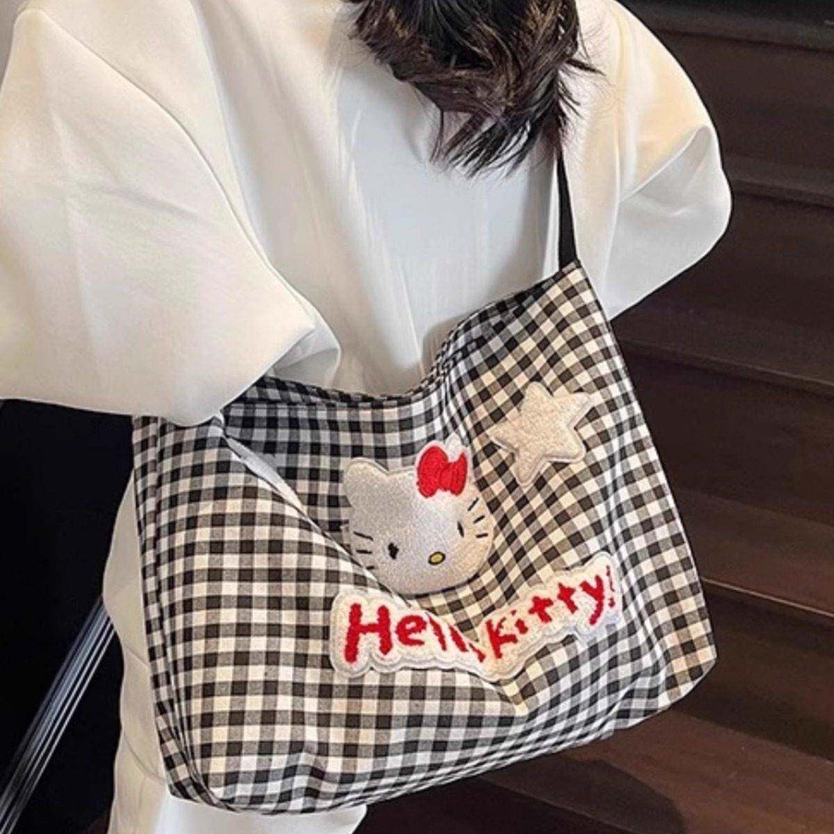 日本可爱HelloKitty格子单肩包女卡通大容量斜挎帆布包学生上课包