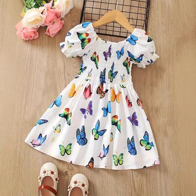 A vibrant butterfly printed dress for girls, suitable for