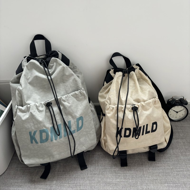 轻便抽绳束口包防水登山包学生羽毛球包休闲旅游大容量背包双肩包