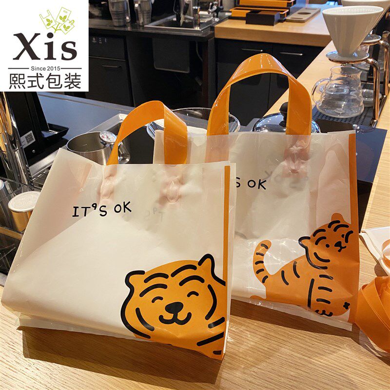加厚塑料袋服装手提袋网红笑脸衣C服包装袋礼品袋商场购物袋大号