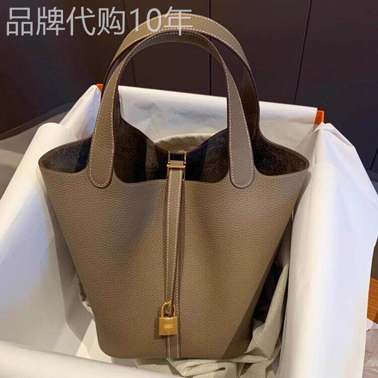 代购真皮高级感2026新款轻奢水桶包八婆菜篮子包女单肩斜挎手提包