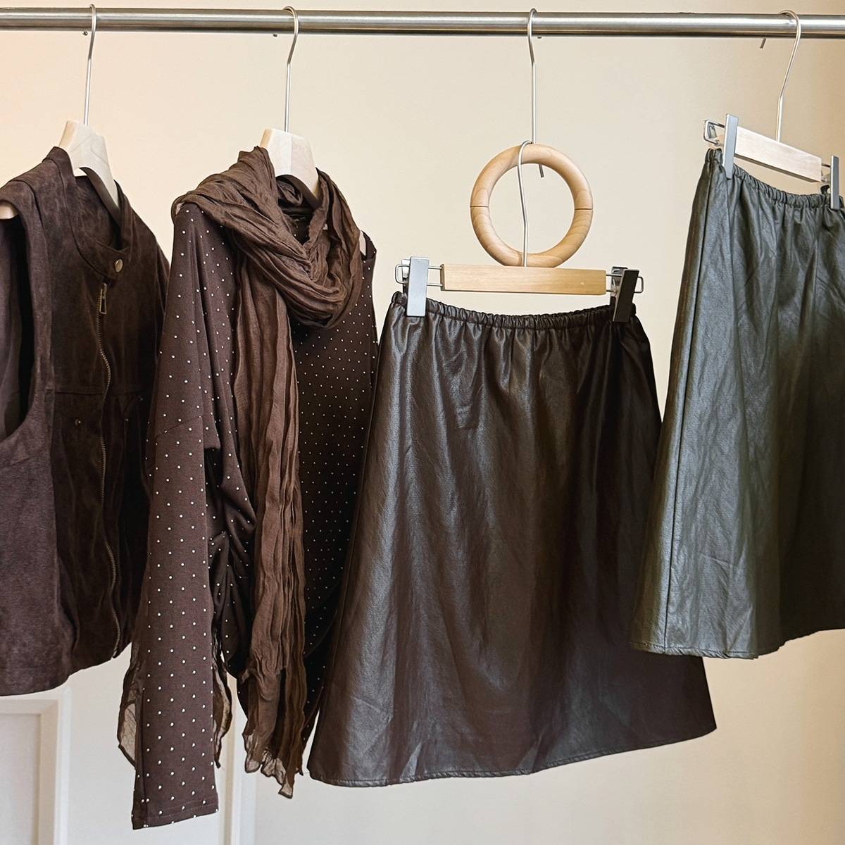 美拉德气质A字皮裙女秋新款高级感宽松显瘦松紧腰时尚百搭半身裙