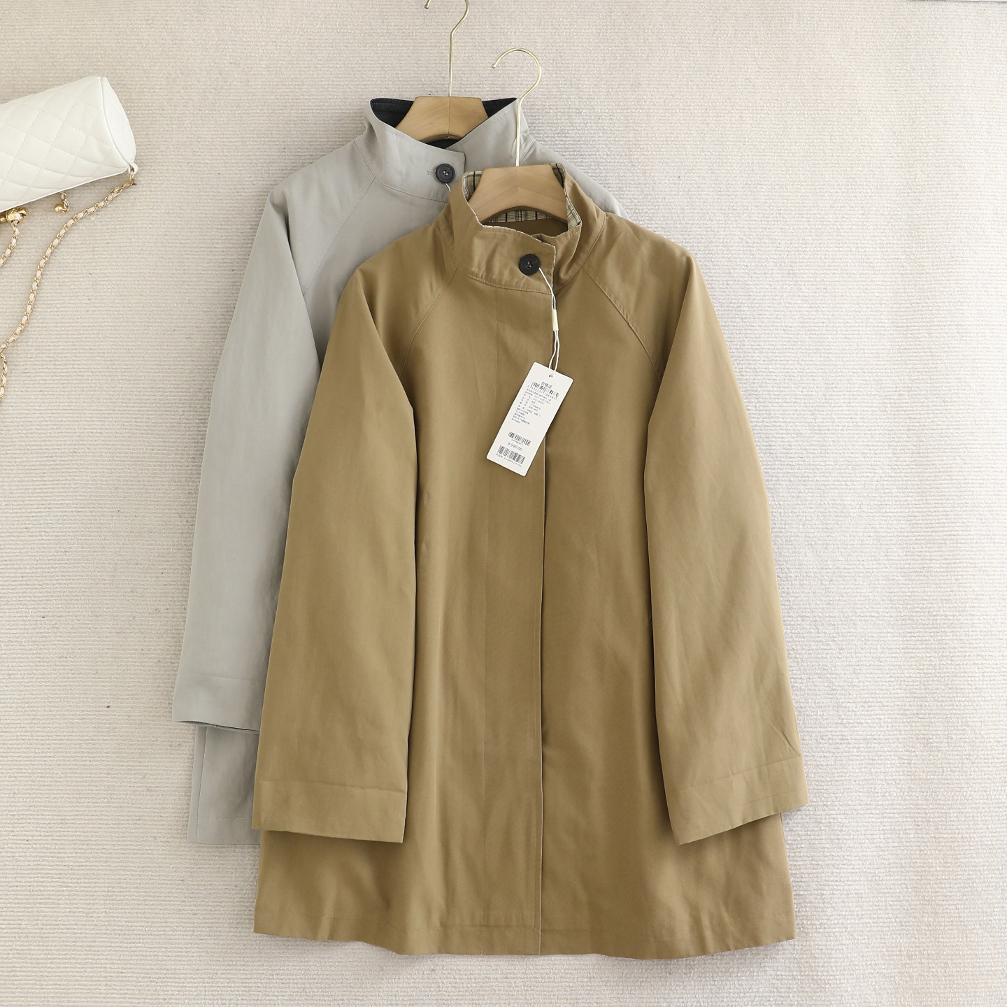 檬系の2026春新款复古英伦风撞色格纹拼接宽松休闲中长款风衣外套,女装/女士精品,风衣,淘宝优惠券,粉丝福利购,淘宝优惠卷