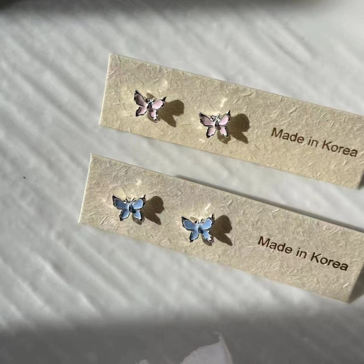 蓝粉蝴蝶耳钉氛围粉色滴釉耳饰