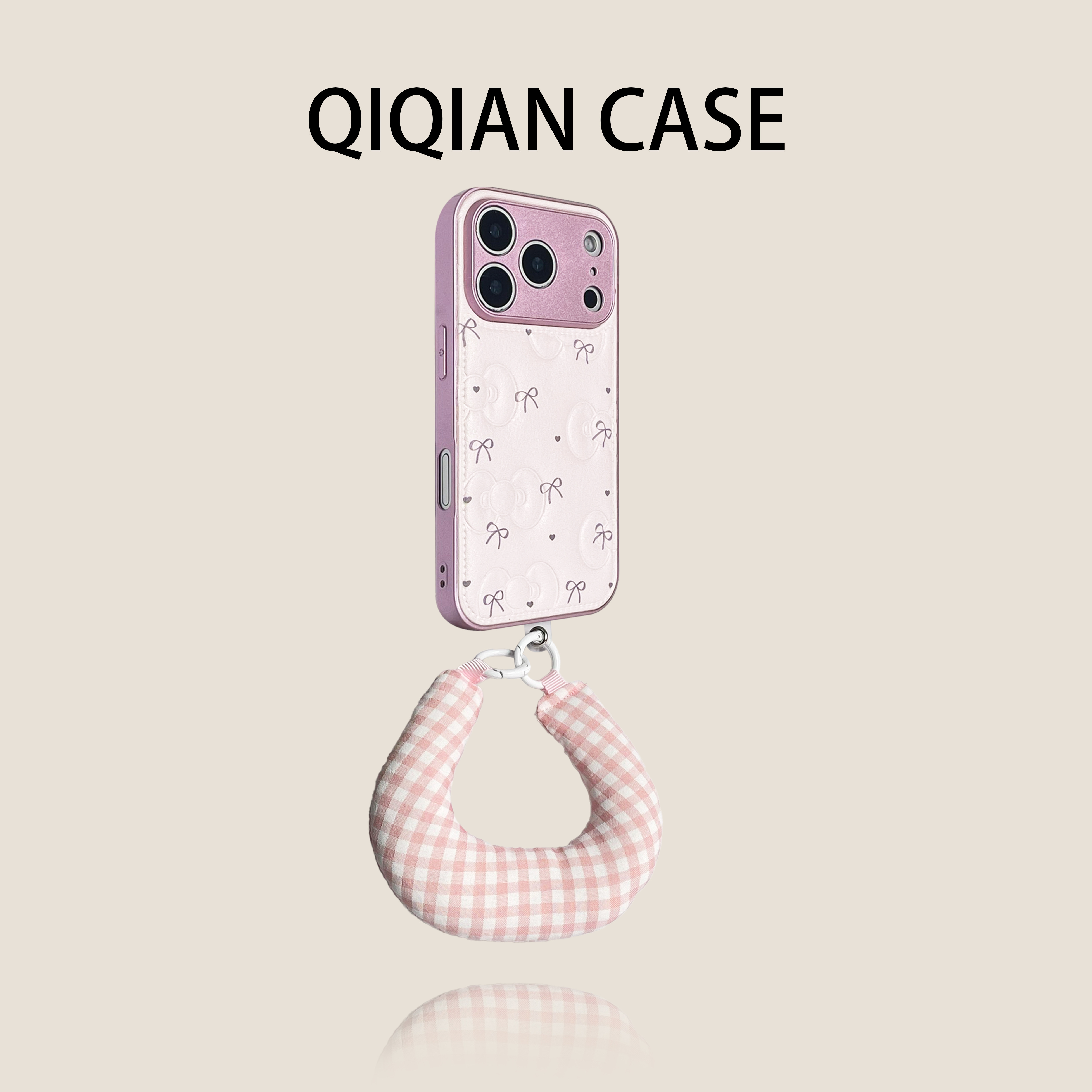 启乾 冬季新款肤感直边鼓包蝴蝶结腕带iPhone17/16手机壳