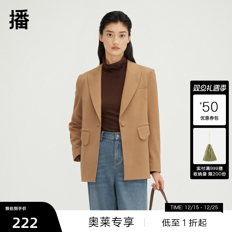 本布纽扣装饰，不对称开衩设计