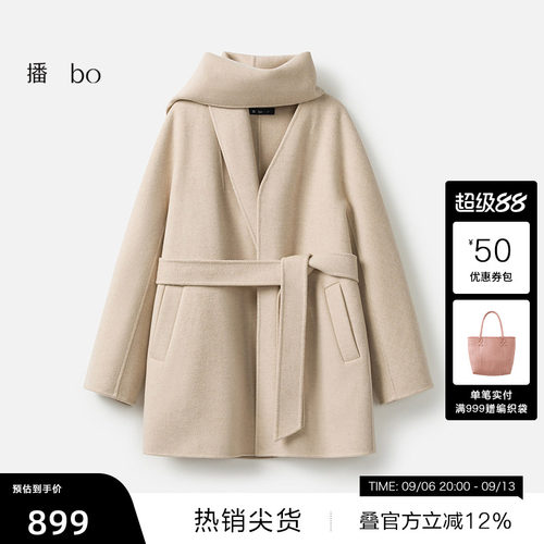 腰间系带收腰，两侧斜插口袋